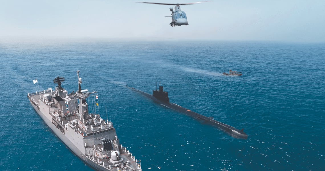Bangladesh Navy frigate, submarine and helicopter at sea